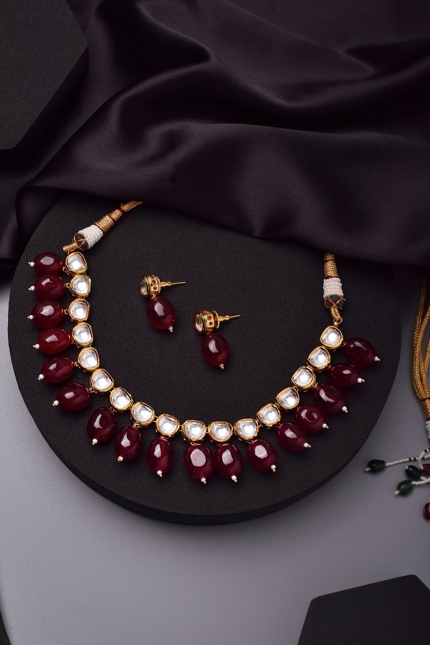 Shereena Maroon Gold Plated Kundan Short Necklace Set