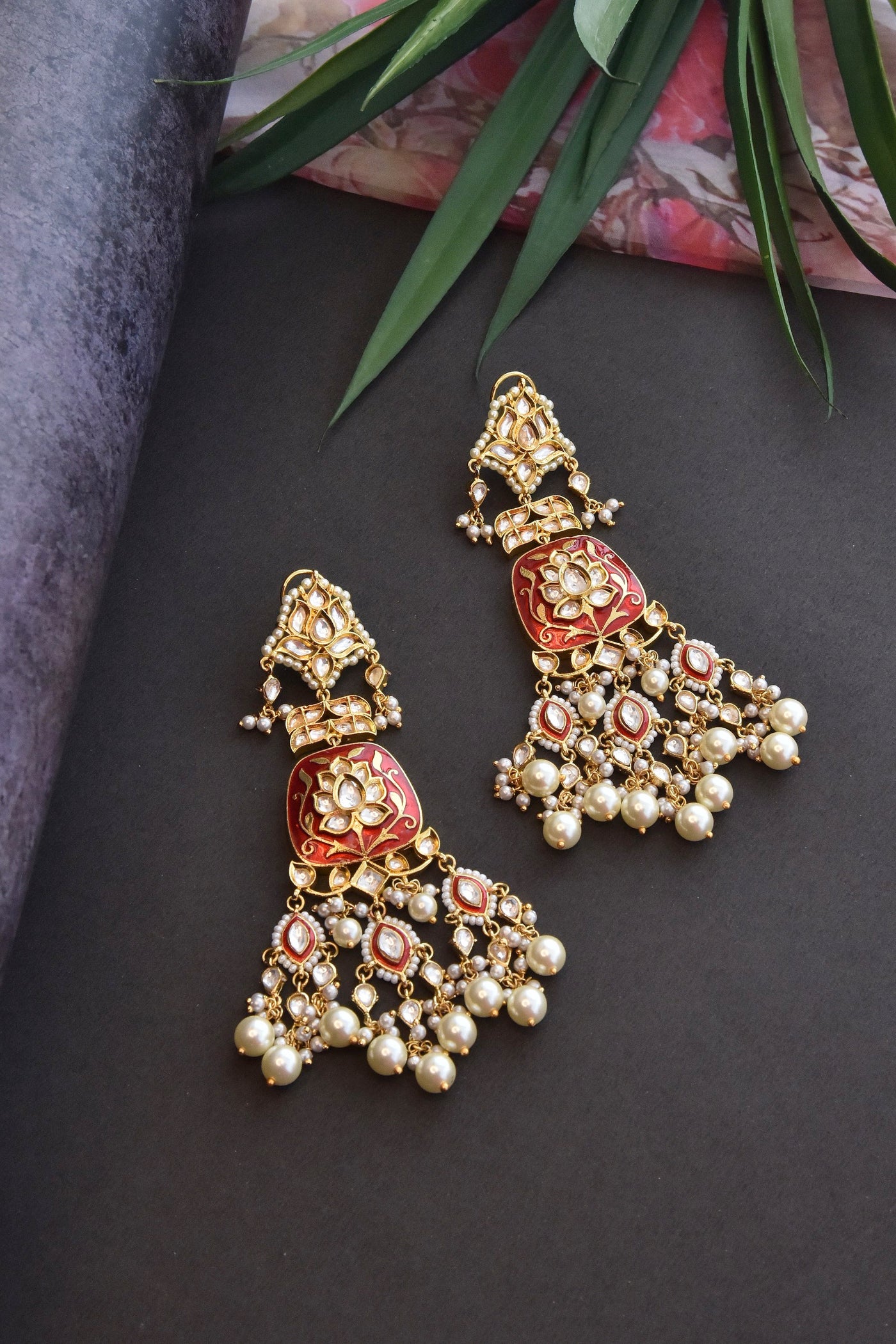 Kavyaa Red Gold Plated Kundan Dangler Earrings