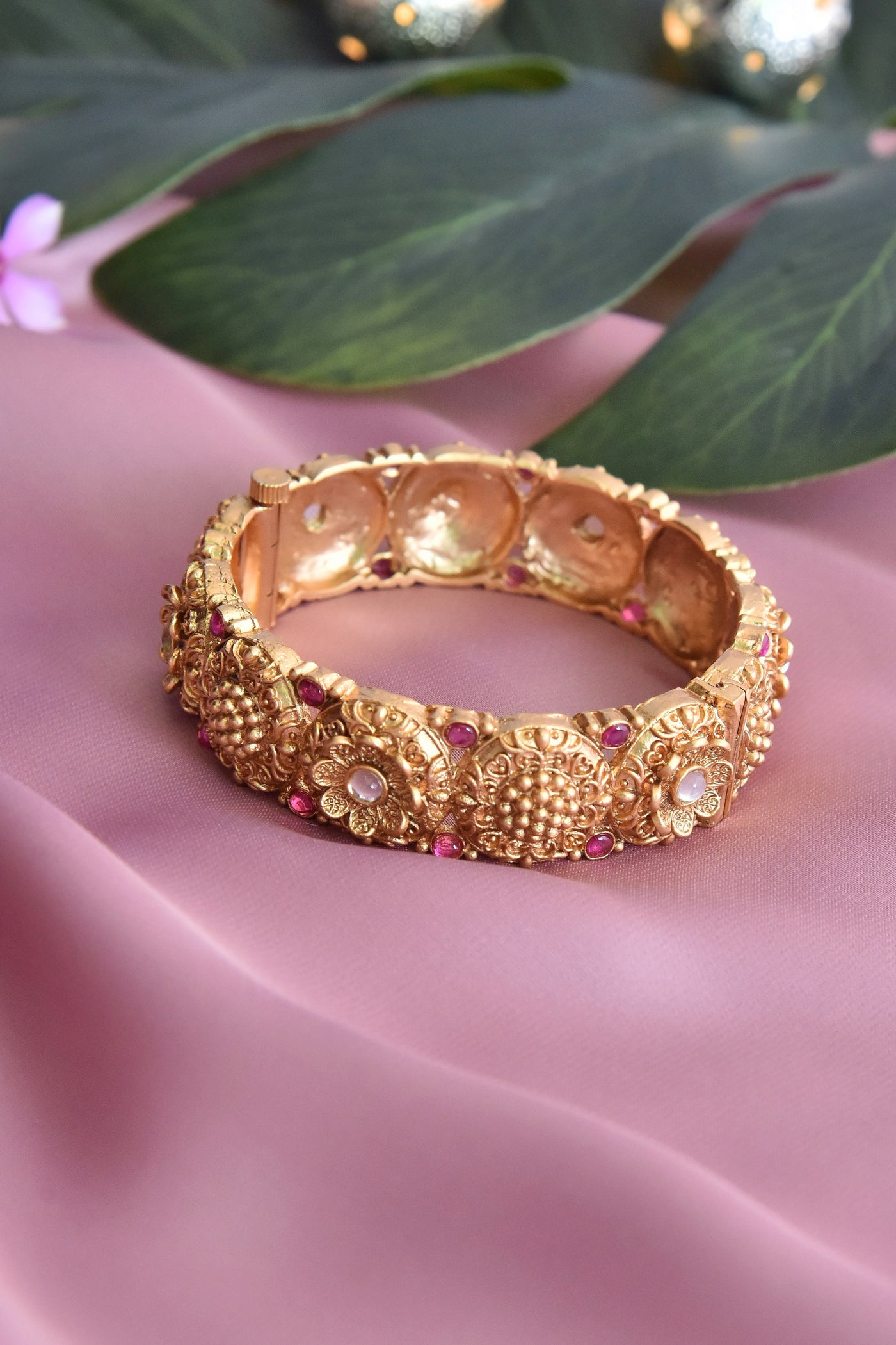 Jaithra Red Gold Plated Lotus Embossed Temple Work Bangle