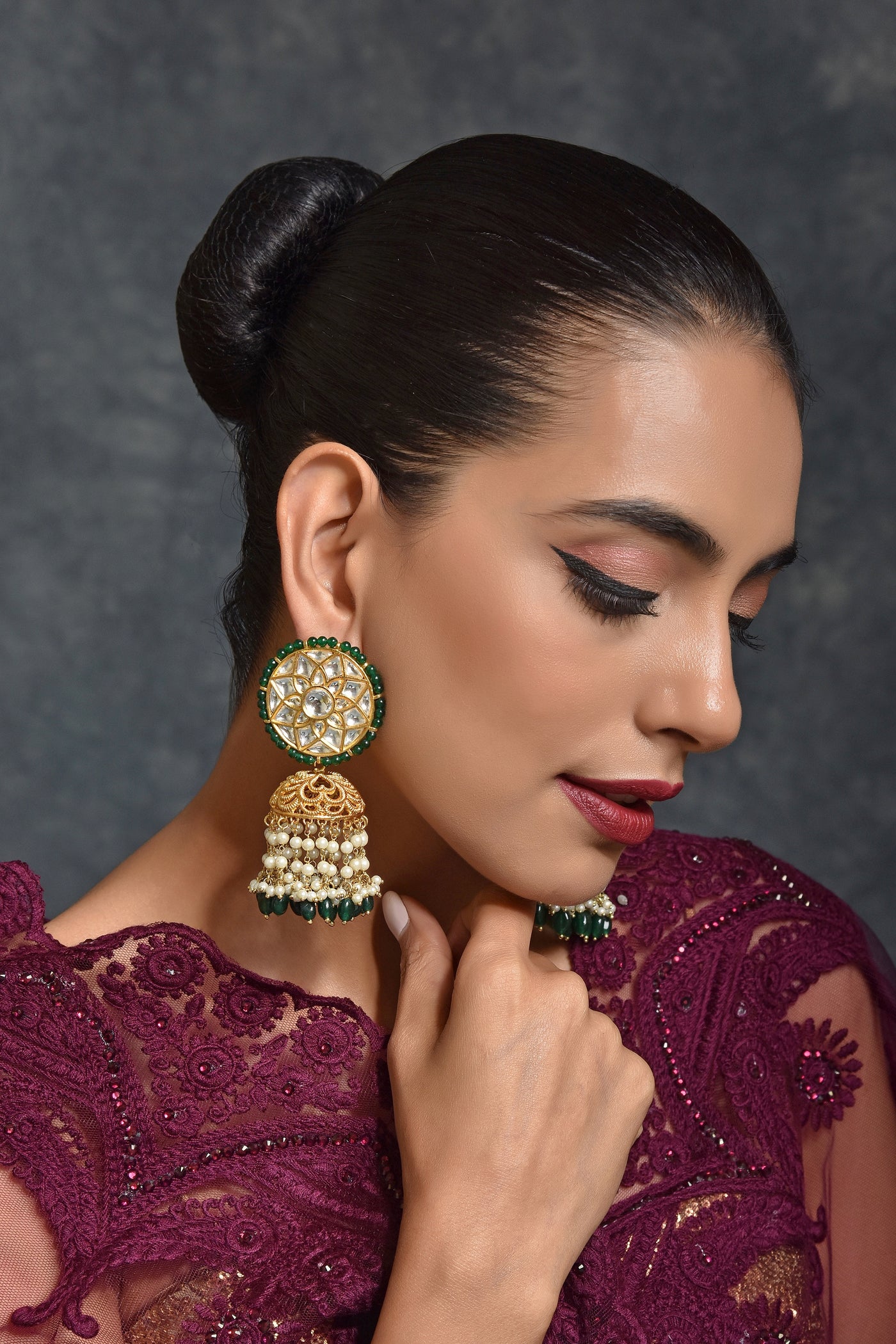 Mavishka Green Gold Plated Kundan Jhumka Earrings