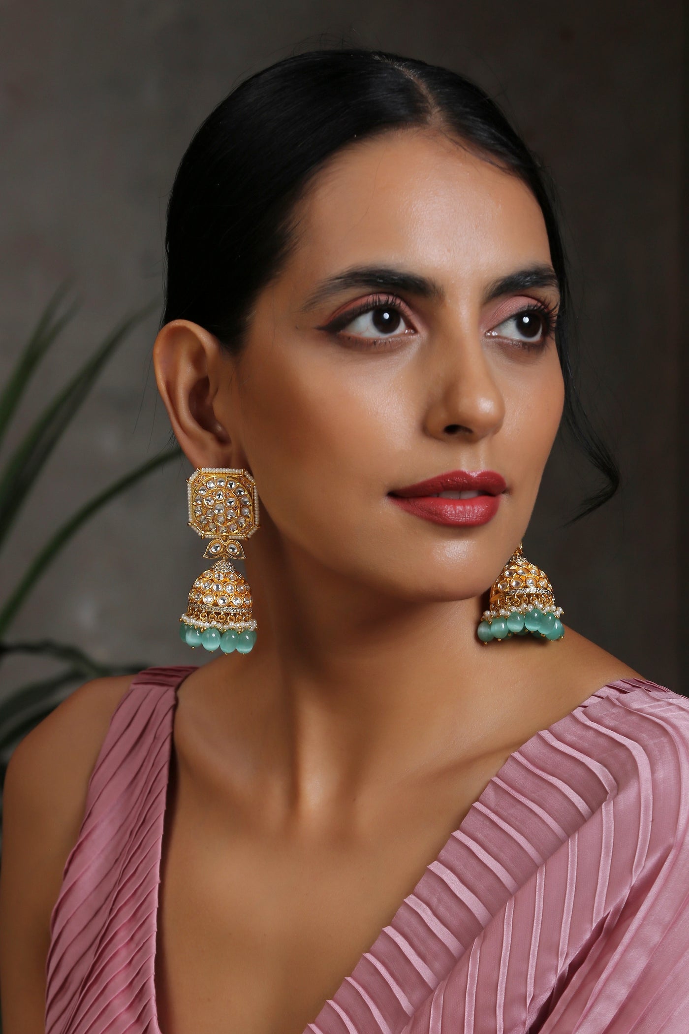Shraja Green Gold Plated Kundan Jhumka Earrings